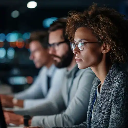 People sitting at computers working